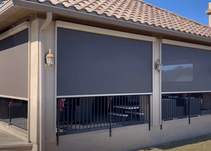 Patio screen installed on San Antonio home blocking afternoon sun