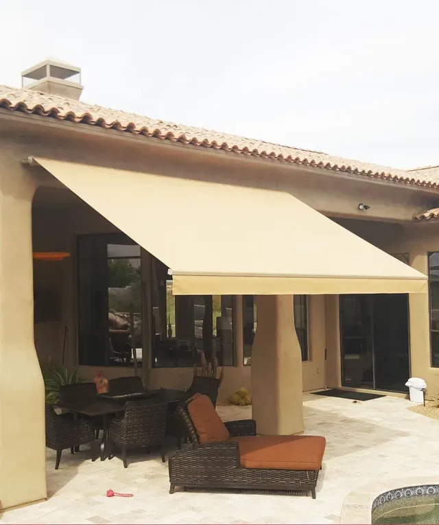 Patio shaded by retractable awning during intense South Texas afternoon sun